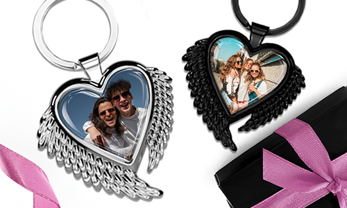 Heart-shaped keychain with wings and photo of best friends