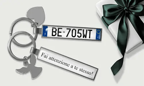 Personalized license plate keychain with heart and wing charms