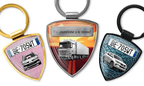 Shield-shaped photo keychain with car and truck designs