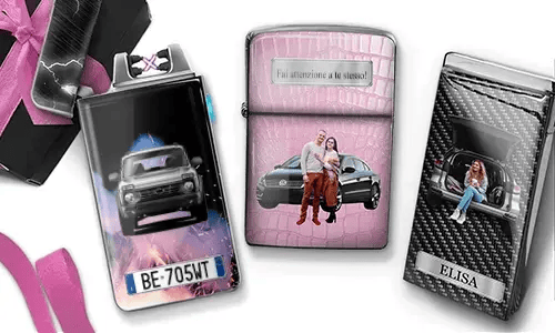 Three custom lighters with romantic car-themed designs: woman in trunk, couple in front of car, carbon-style car