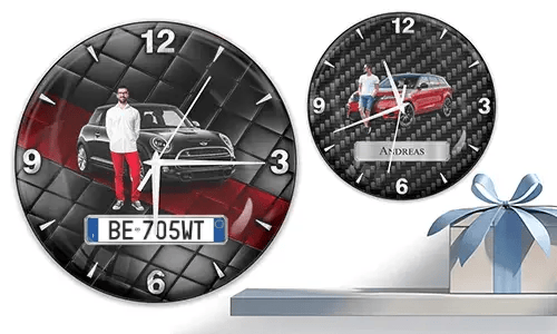 Two wall clocks with male figures and cars: left with black car on quilted background, right with red car and carbon texture