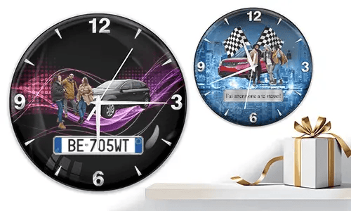 Two wall clocks with group car scenes: left with black car and purple waves, right with red and black cars, racing flags, and blue background