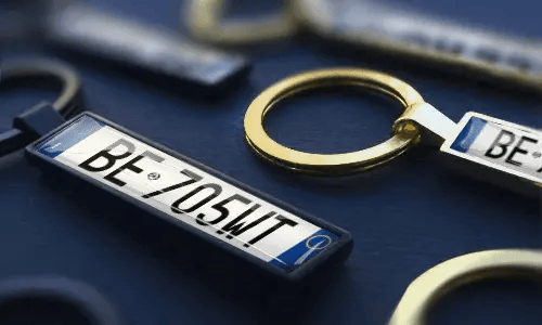 Metal license plate keychains highlight personalized messages as gift ideas