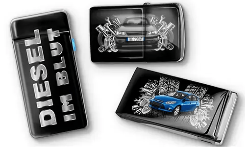 Three black car-themed lighters with metallic accents. One has 