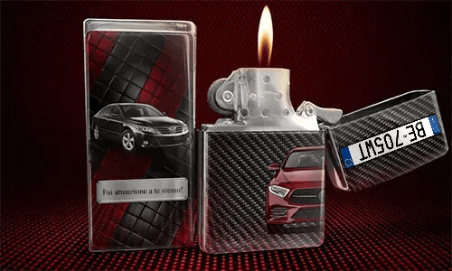 Flip-top lighter with flame: red car on carbon fiber background, black car with name JONAS on quilted panel