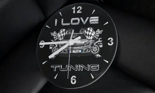 Wall clock with modified car, racing flags, wheels, and I LOVE TUNING text on black background
