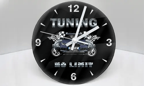 Wall clock with stylized car, checkered flags, and metallic TUNING NO LIMIT text on black background
