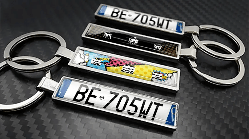 Comic style metal keychains with car illustrations and custom license plate design